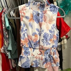 White and Blue Ruffled Peplum Sleeveless Blouse